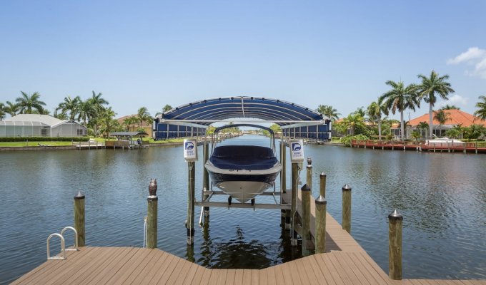 Cape Coral Waterfront Villa Vacation Rental with heated pool and a canal view