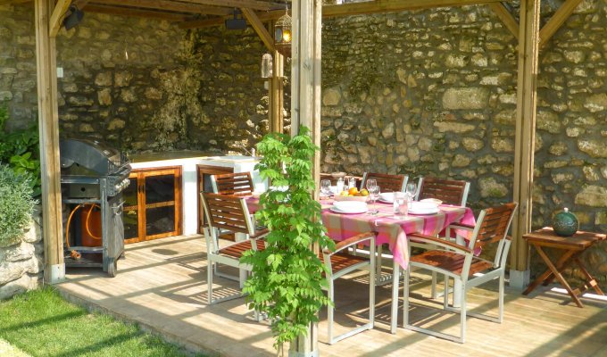 Shaded terrace with gas bbq