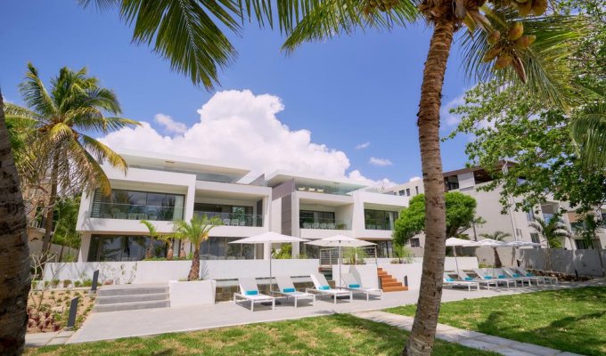 Mauritius beachfront Penthouses rentals in Trou aux Biches with communal pool and tropical garden