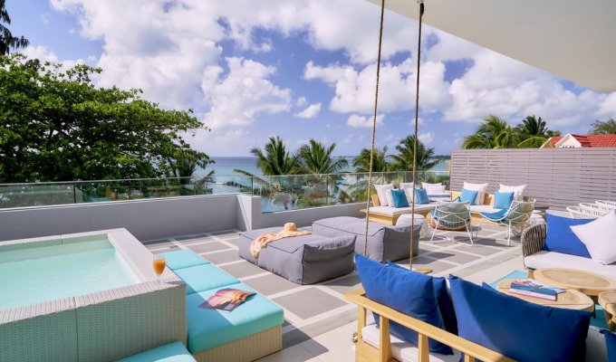 Mauritius beachfront Penthouses rentals in Trou aux Biches with communal pool and tropical garden