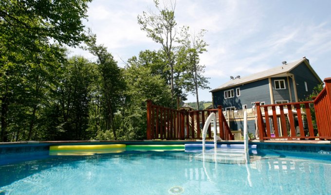 Quebec Stoneham Cottage Vacation Rentals with large terrace and private pool