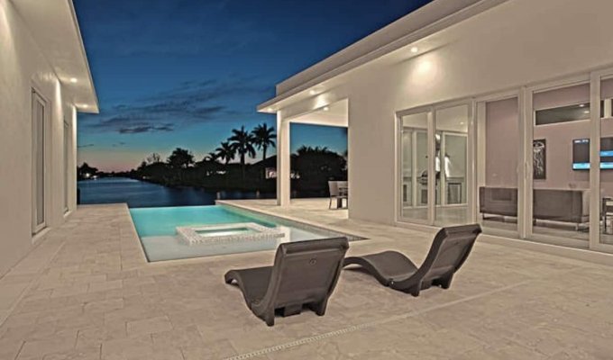 Cape Coral Waterfront Villa Vacation Rental with heated pool and a canal view