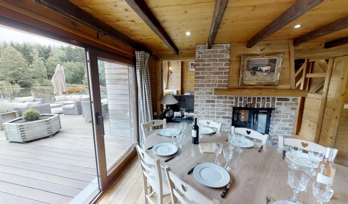 Ardennes holiday chalet rental 5* on the edge of its lake in a green setting