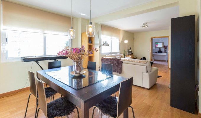 Spacious living room with wood stove