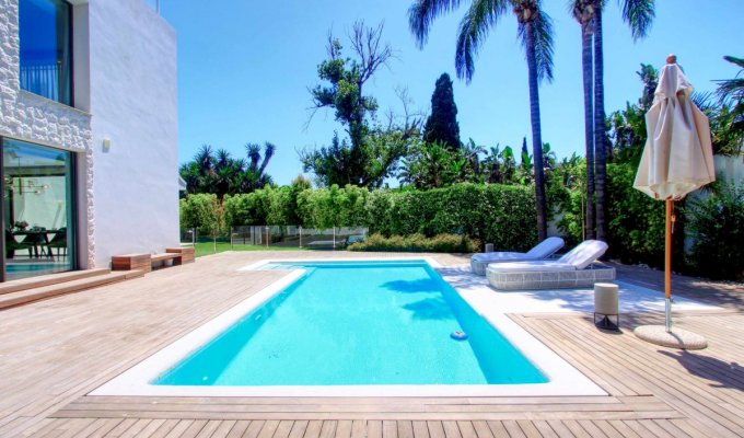 Heated pool in a fenced garden