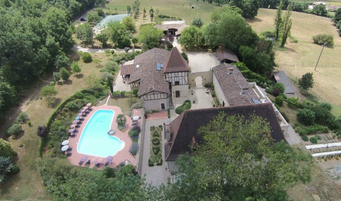 Aerial view of Missandre - Terrace of the "grand gîte"  between the pool and tennis courtMissandre