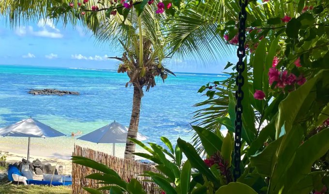 Beachfront Mauritius Villa in Roches Noires close to Belle Mare, private pool & staff 
