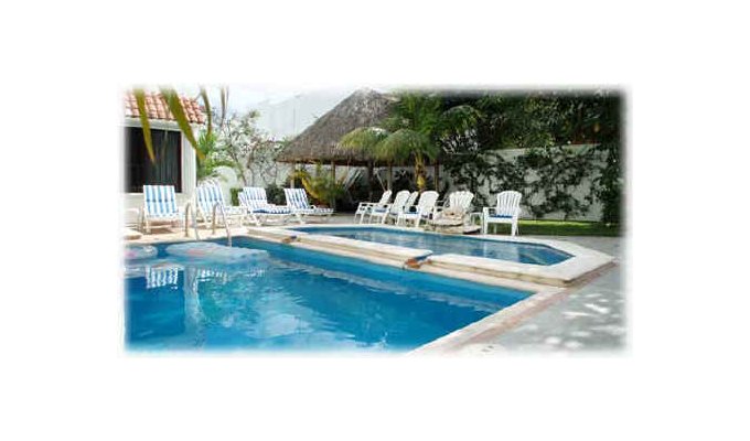 Across the pools to the patio and garden
