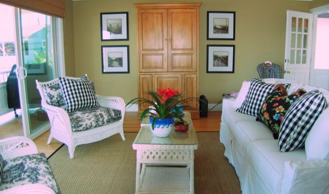 Living Area of Great Room Casa 225 that opens to the large Deck with Bay Beach Views