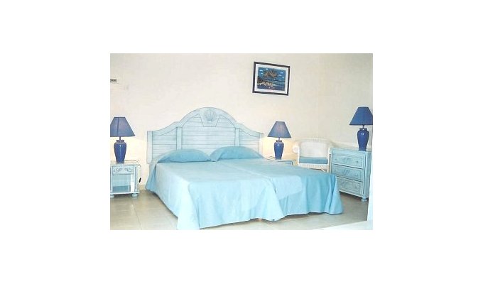 Aparthotel **** Pscine rental bungalows facing the sea town Deshaies Guadeloupe Basse Terre